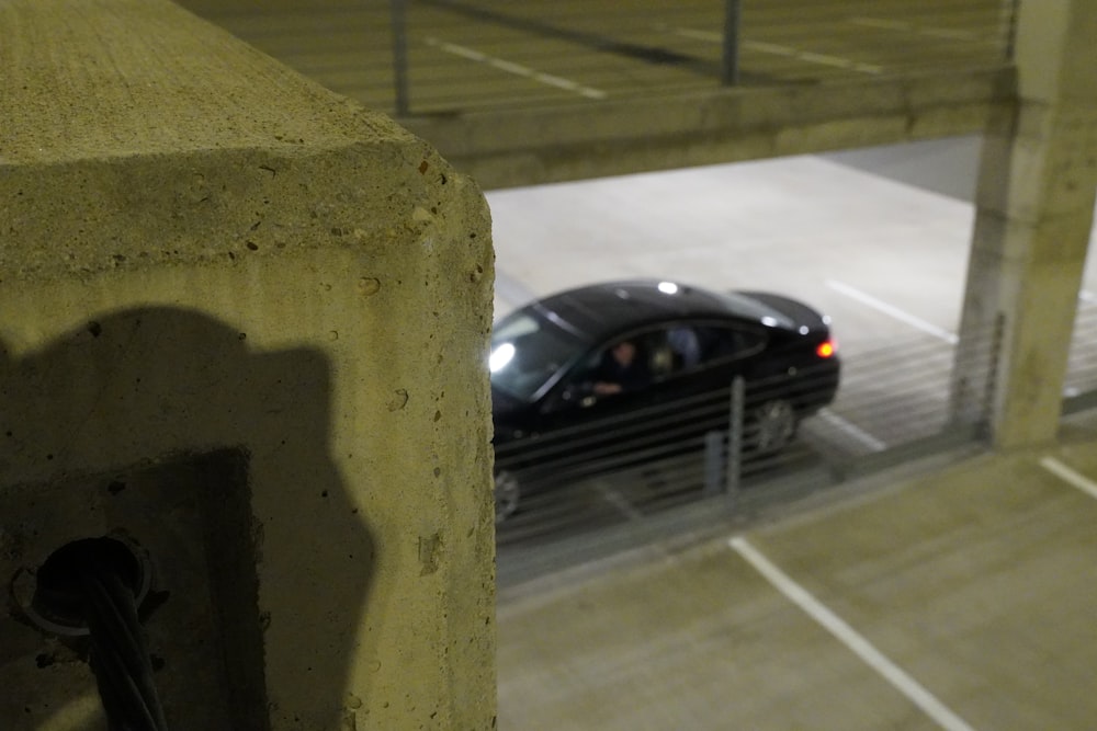 a car is parked in a parking garage
