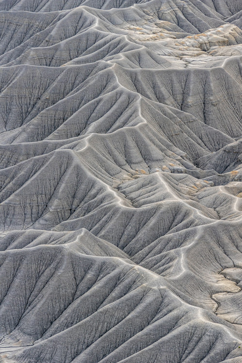 an aerial view of a mountain range in the desert