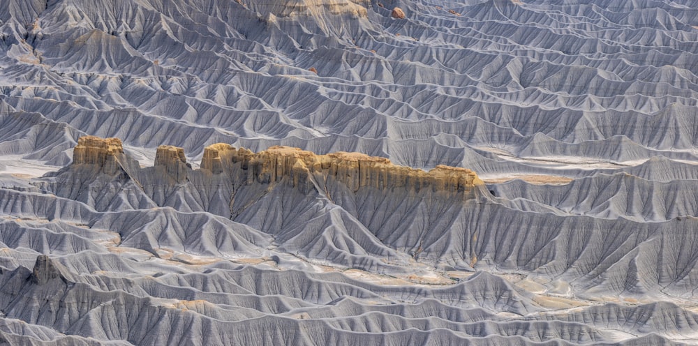 an aerial view of a mountain range in the desert