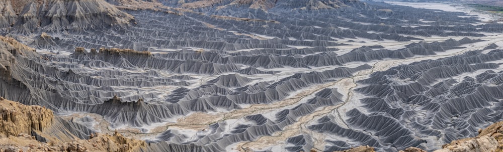 an aerial view of a mountain range in the desert