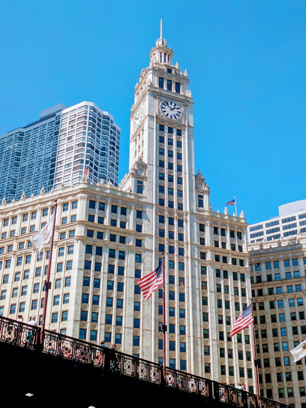 a tall building with a clock on the top of it