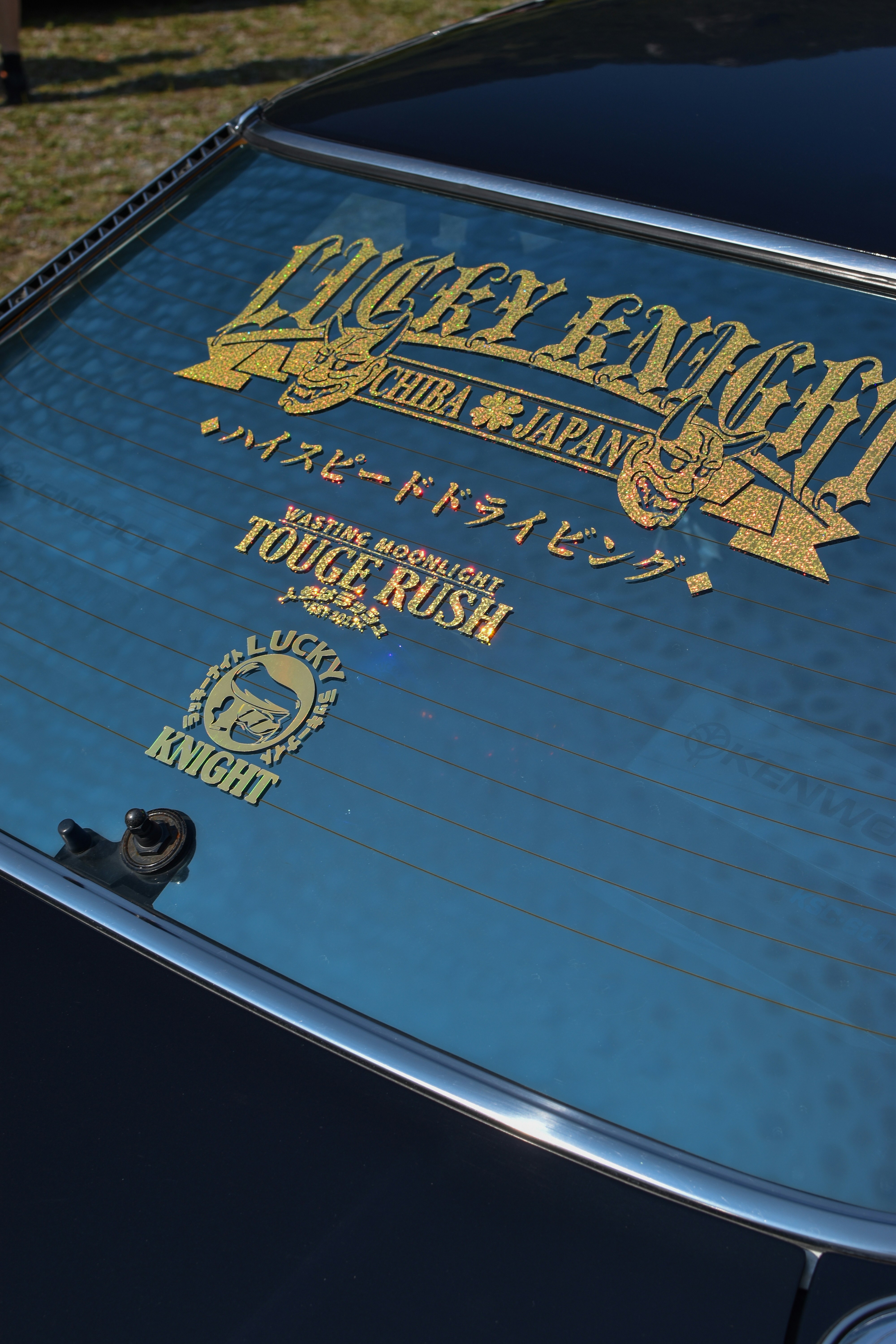 a close up of a car with a sticker on it