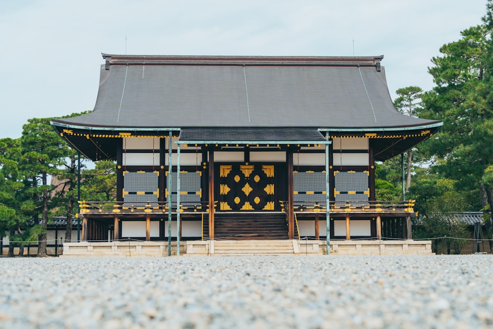 a small building with a wooden door and windows