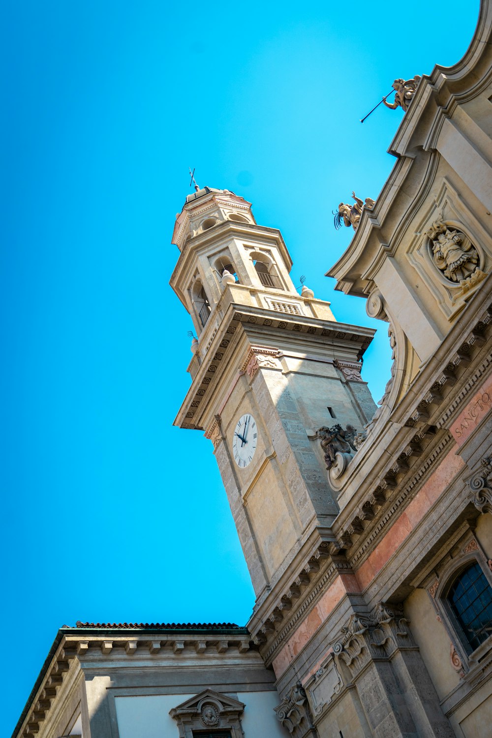 a tall building with a clock on it's side