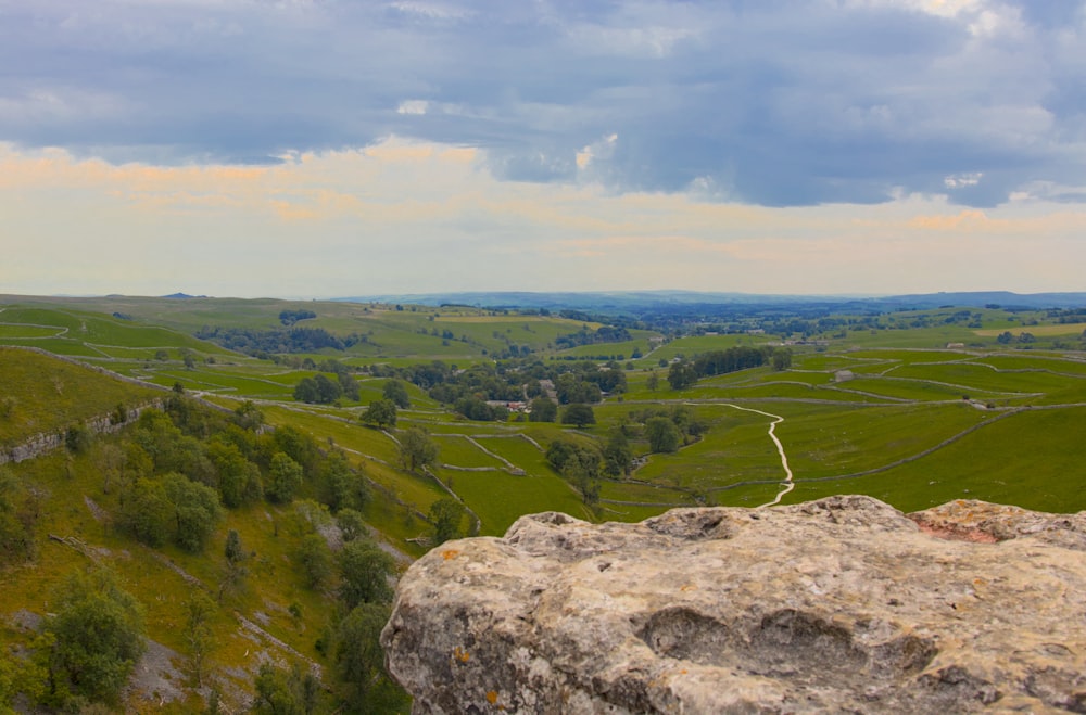 a view of a valley from the top of a hill