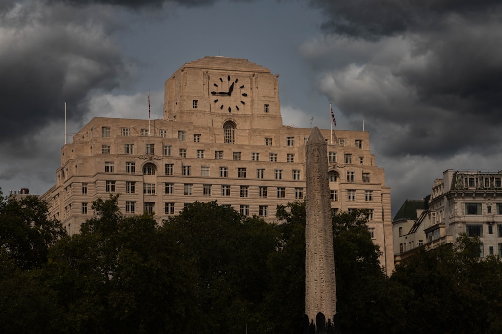 a large building with a clock on the top of it