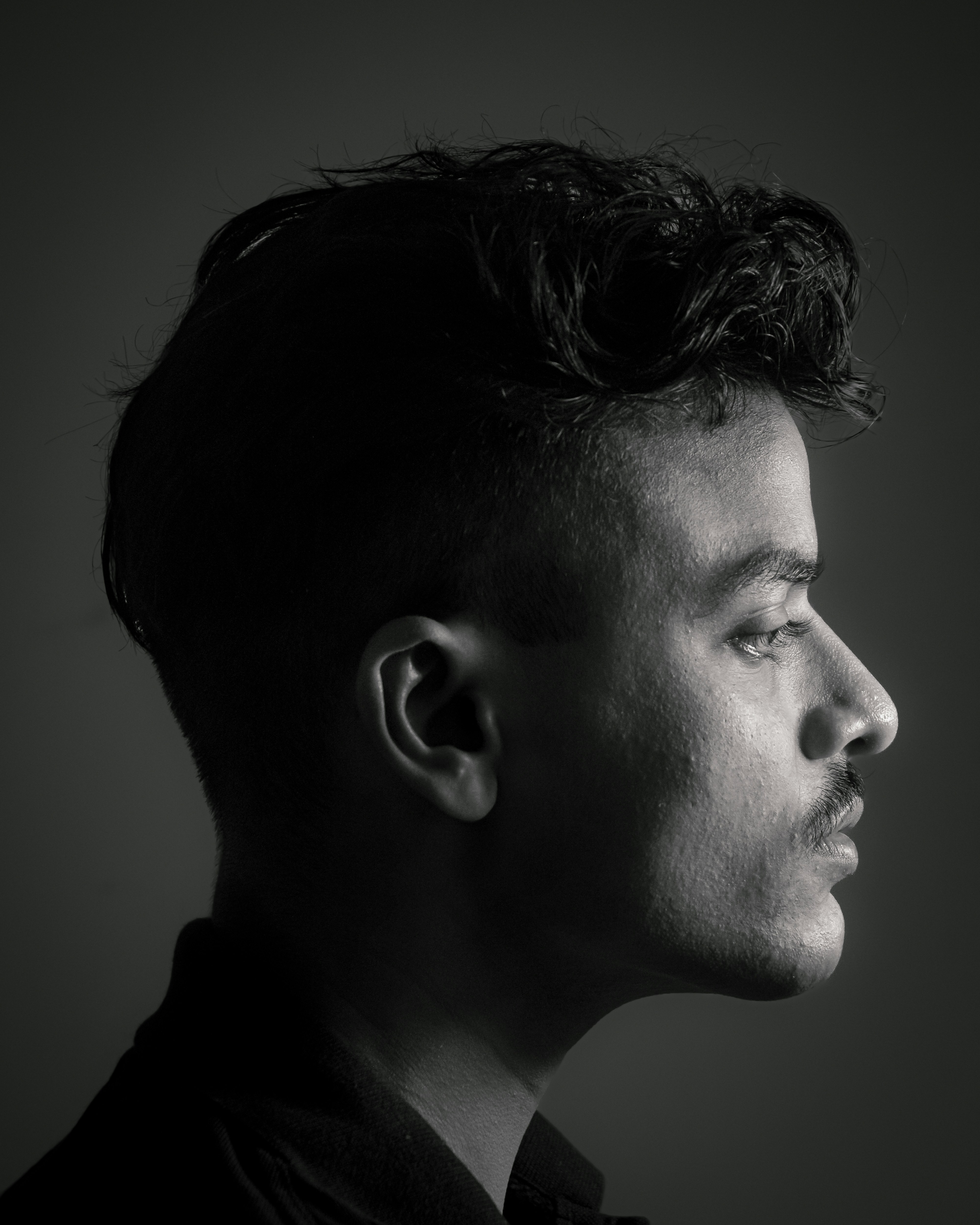 A black and White side portrait