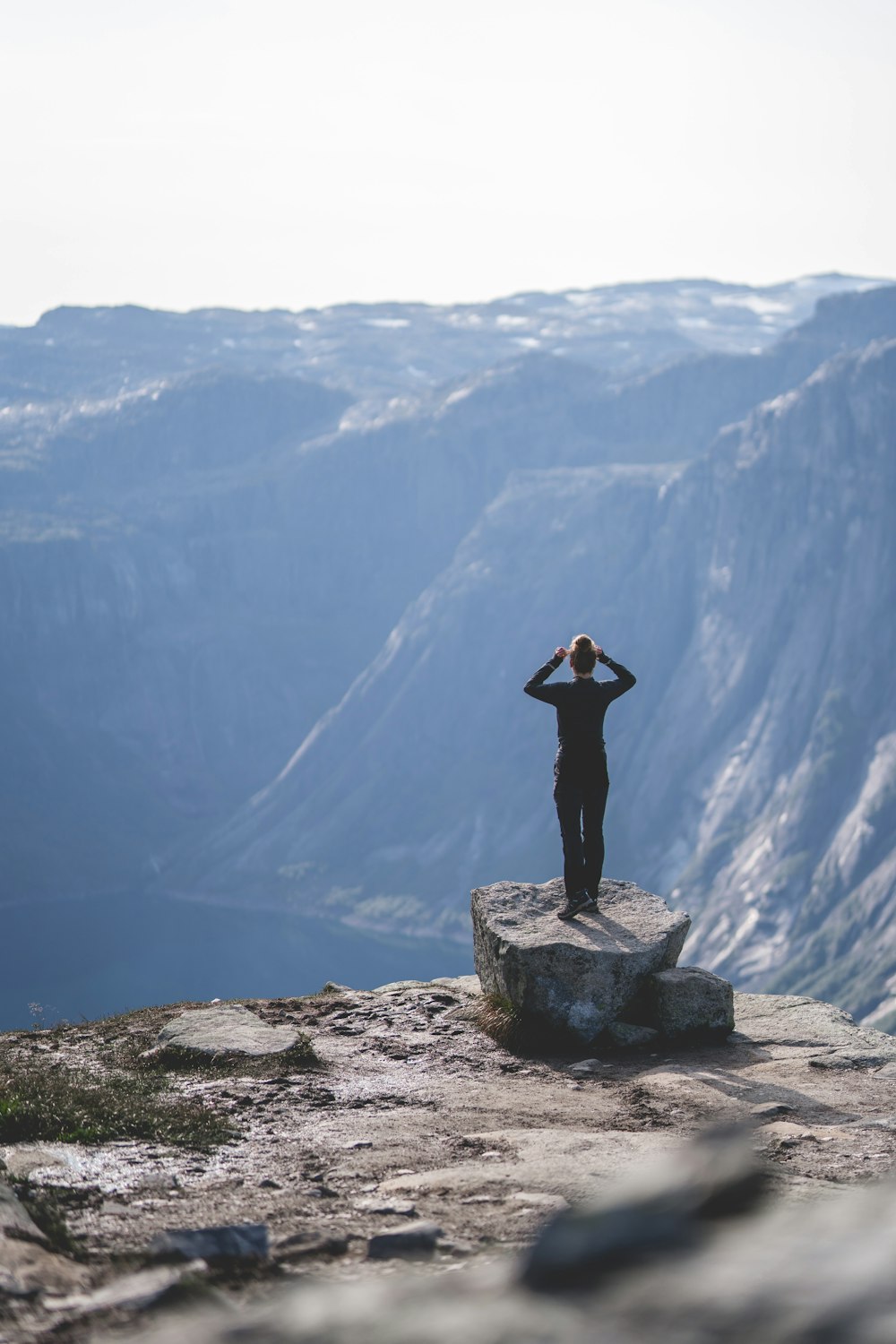 a person standing on top of a mountain