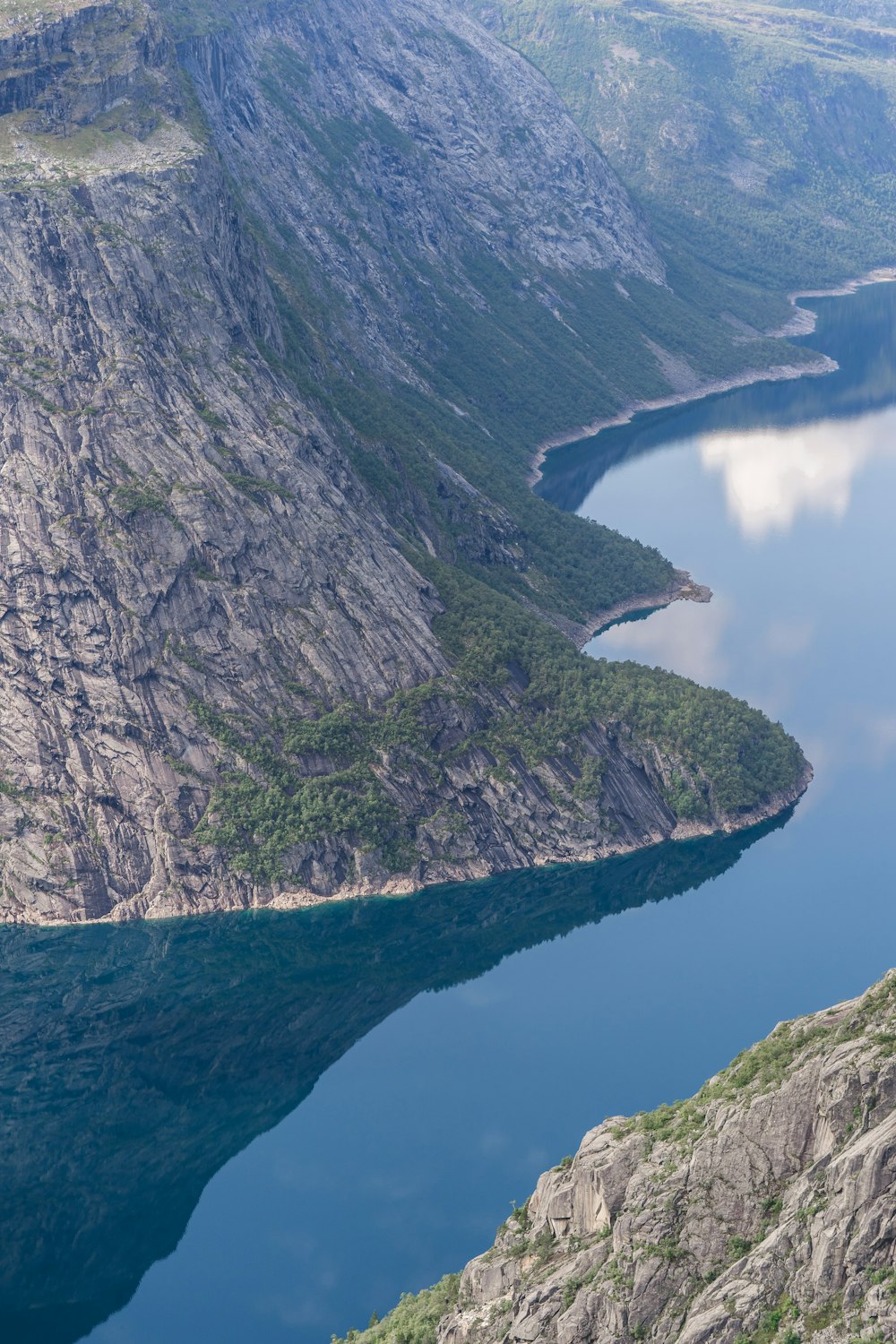 a large body of water surrounded by mountains