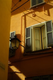 Exterior wall painted with bright, weather-resistant sspaints gloss and shine finish under natural sunlight.