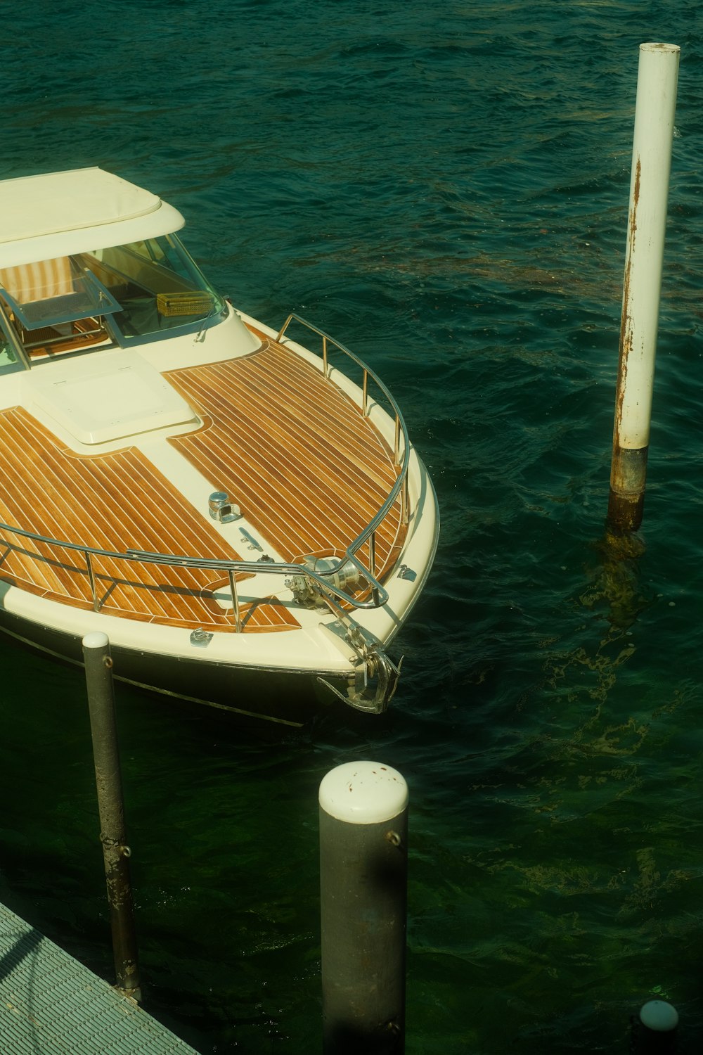 a boat docked at a dock in the water