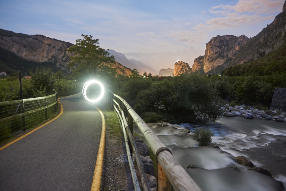 a road that has a light in the middle of it