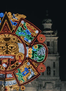 A vibrant Mayan calendar stone with intricate glyphs glowing under soft sunlight.