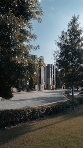 A quiet street view of peaceful apartment buildings in Coimbatore.