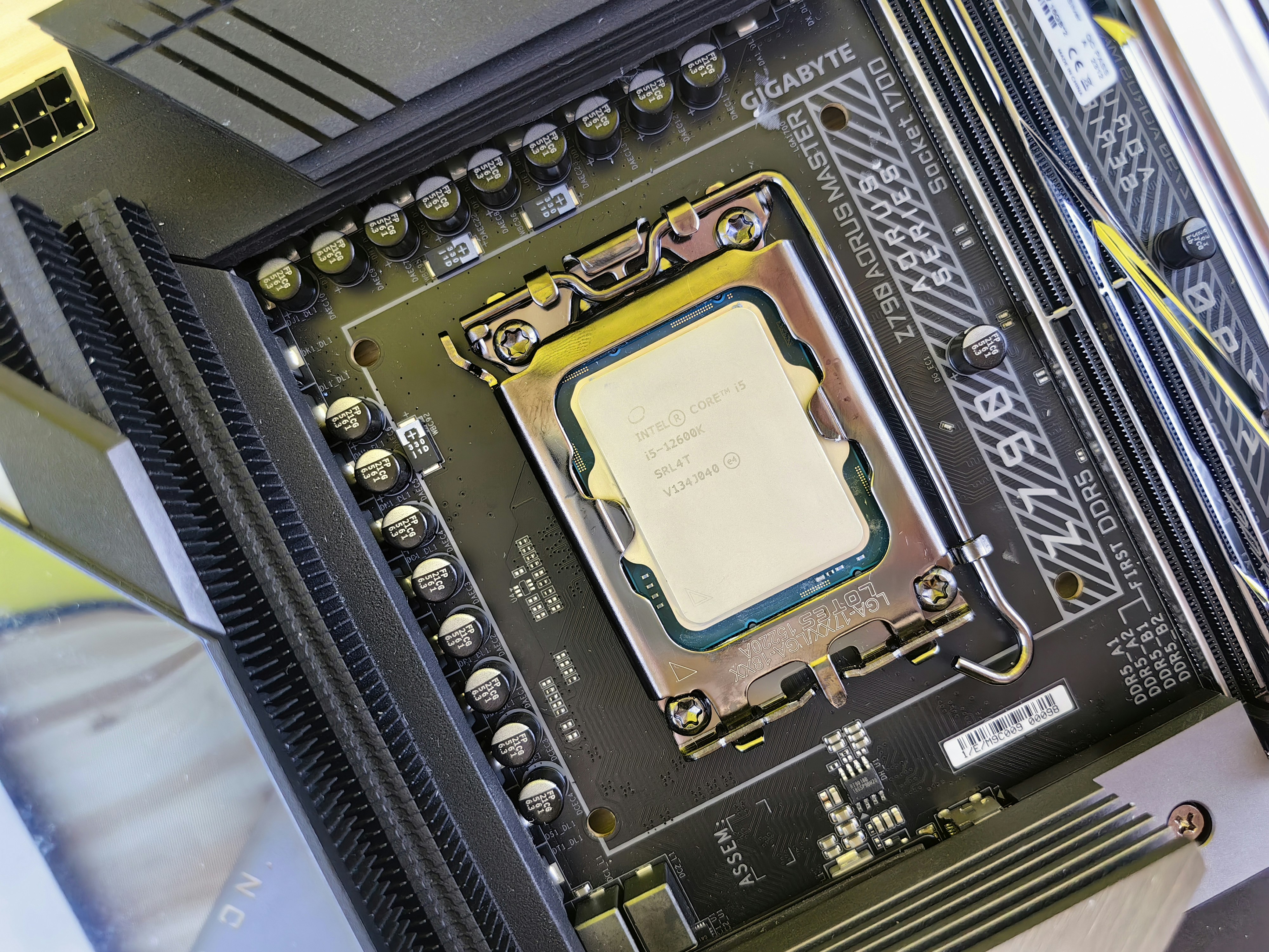 High-performance graphics card installed in PC motherboard with power cables connected