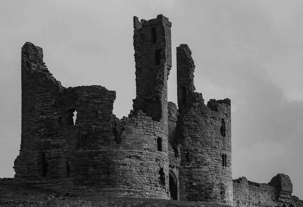 a black and white photo of a castle