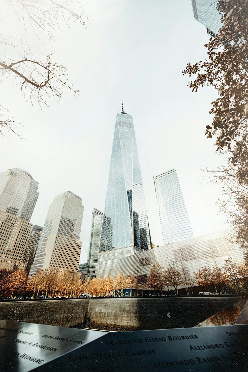 a view of a very tall building in the city