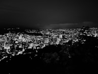 Night view of the city skyline illuminated with sparkling lights.