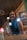 A joyful customer smiling in a cozy, elegant setting.