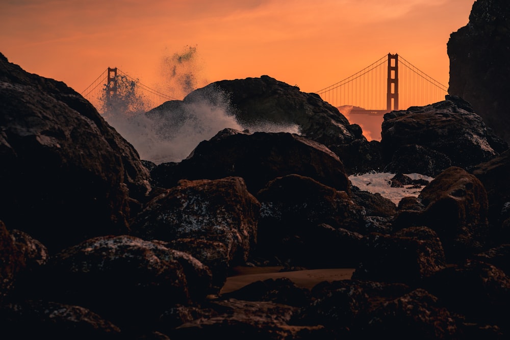 a view of the golden gate bridge at sunset