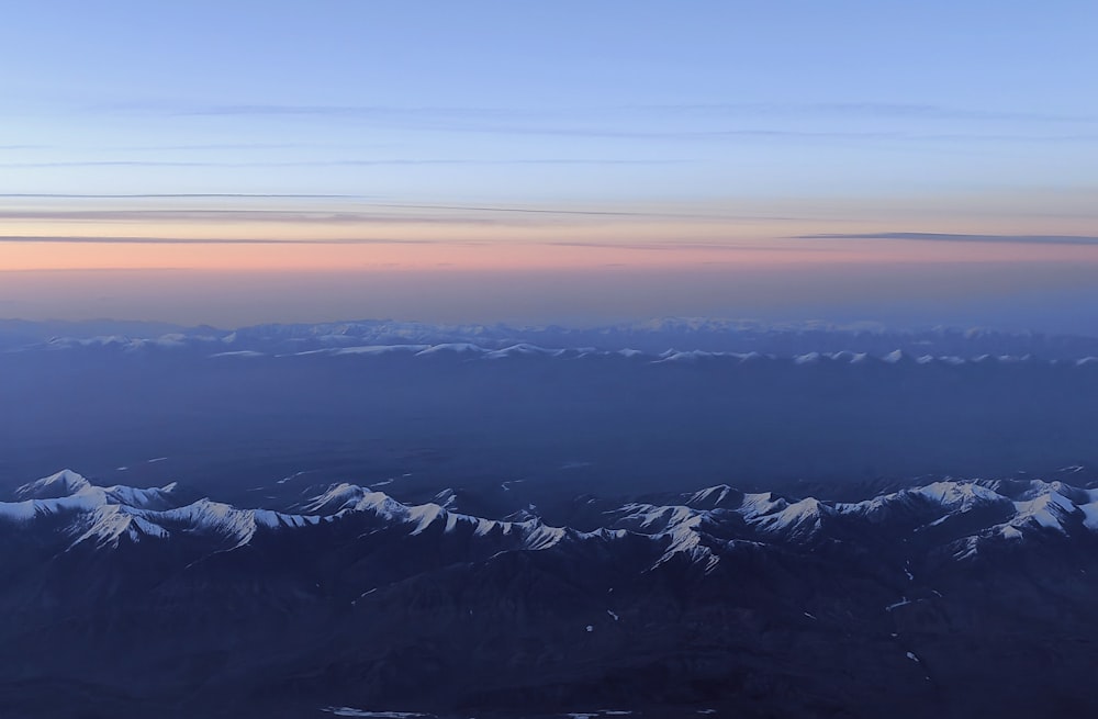 a view of a mountain range from an airplane