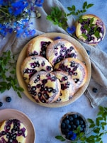Elegant display of assorted pastries with a modern blue background.