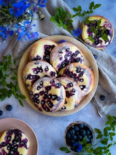Elegant display of assorted pastries with a modern blue background.