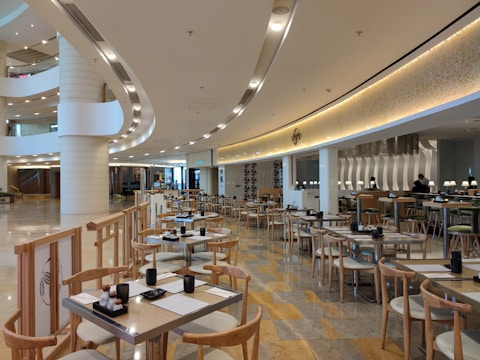 A stylish dining area featuring wooden elements and decor.