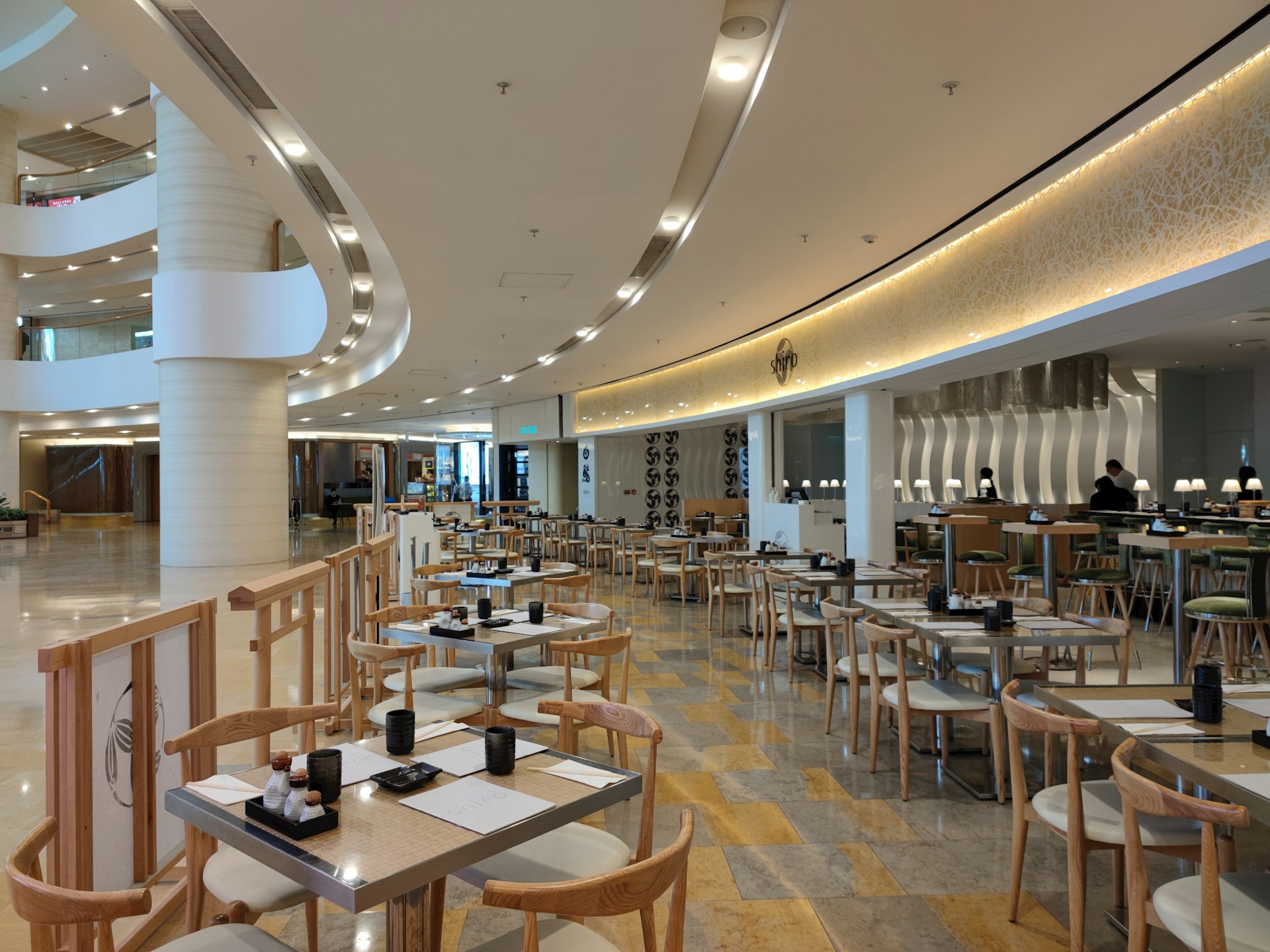 A cozy and modern dining area of the restaurant, reflecting the warm atmosphere and stylish decor.