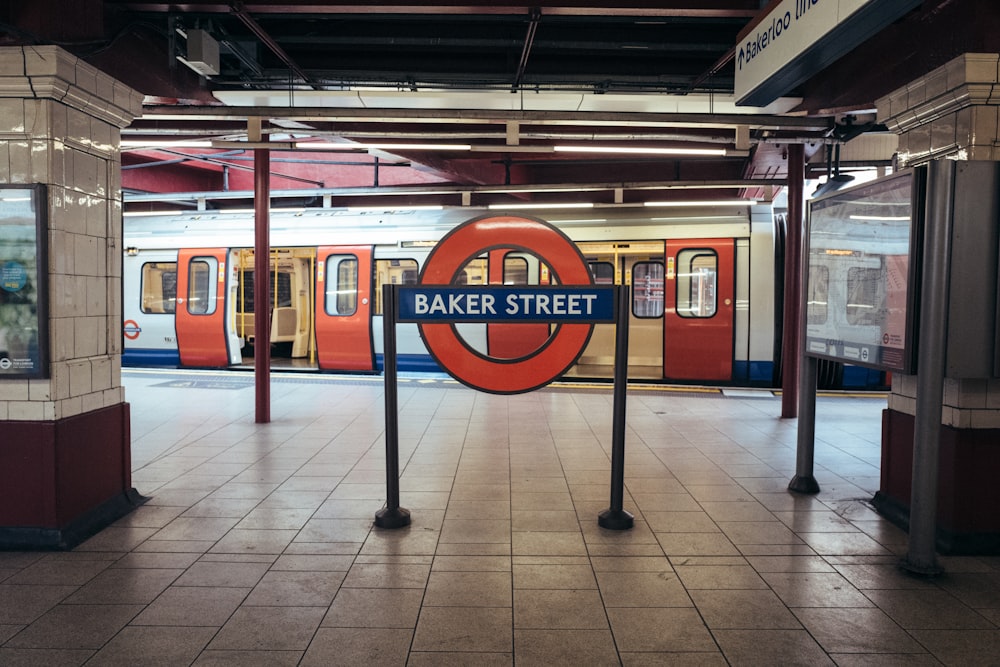 a train station with a sign that says baker street