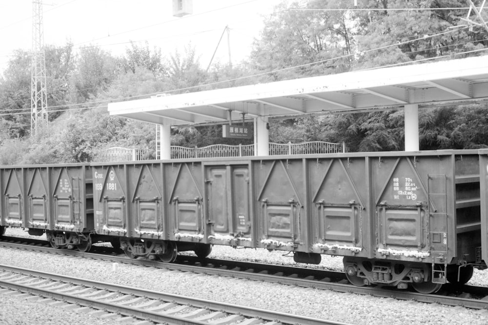 a black and white photo of a train car