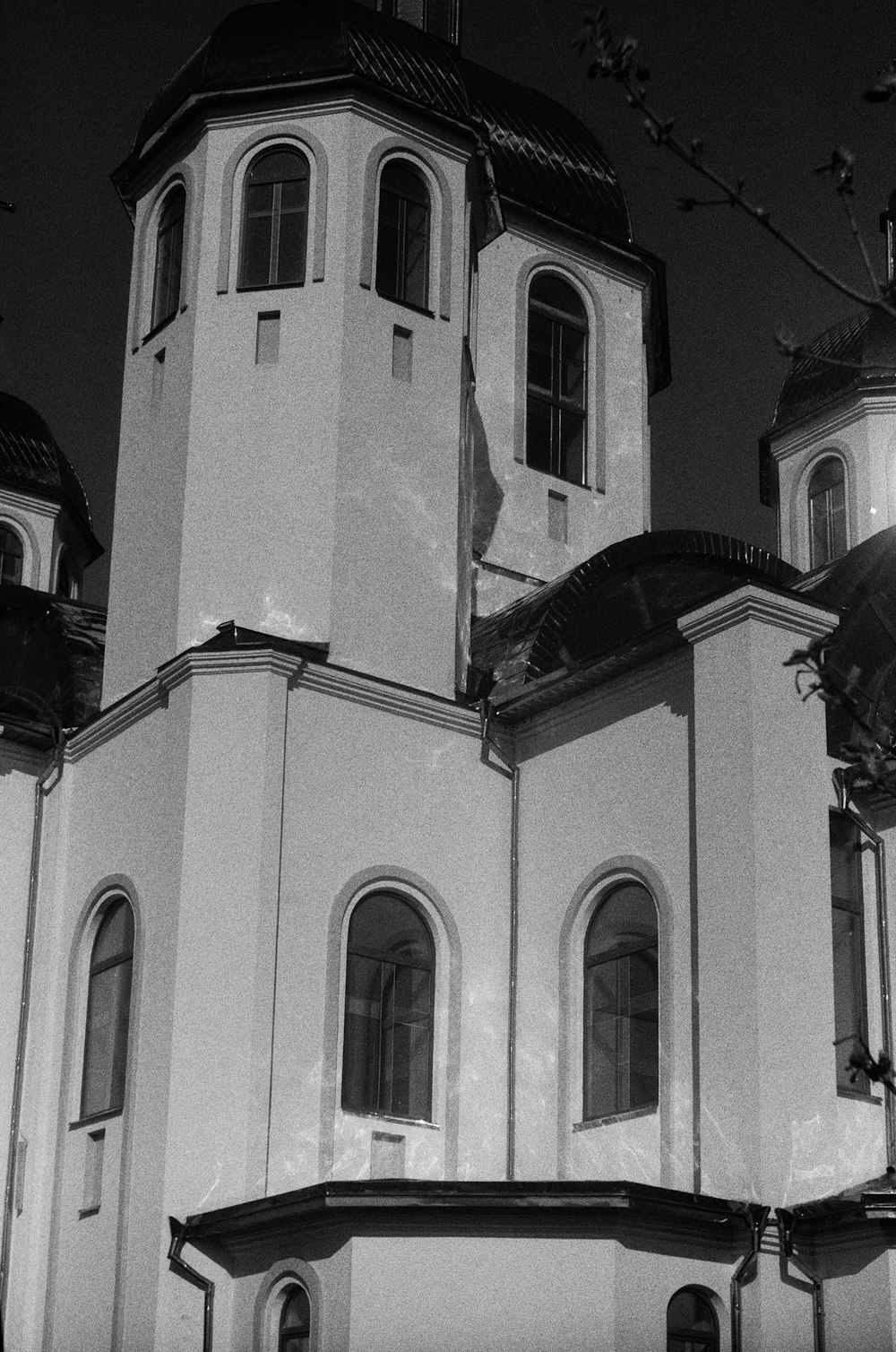 a black and white photo of a church