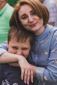 A caring volunteer offering comforting support to a young bite victim.