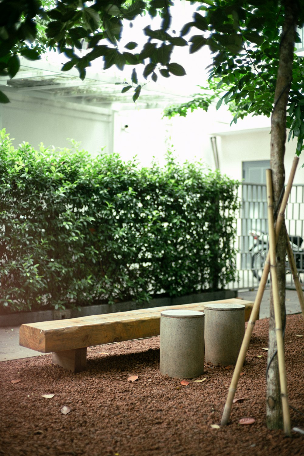 a wooden bench sitting in the middle of a park