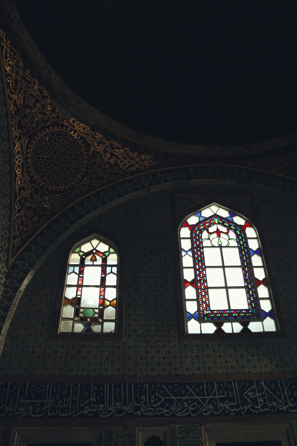 two stained glass windows in a building