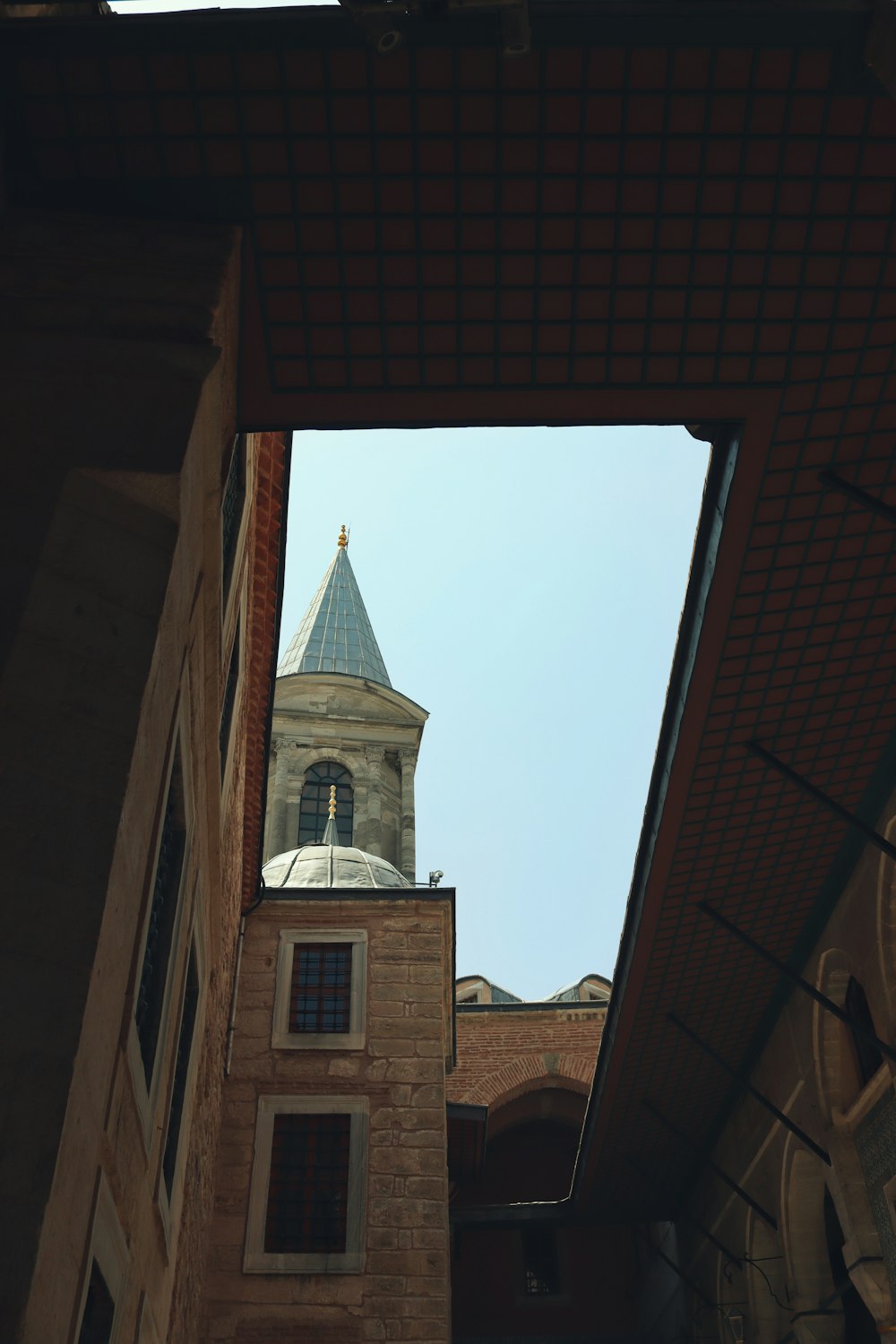 a tall building with a clock on it's side