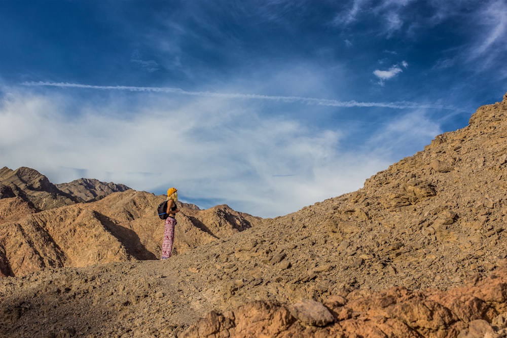 a person standing on top of a mountain