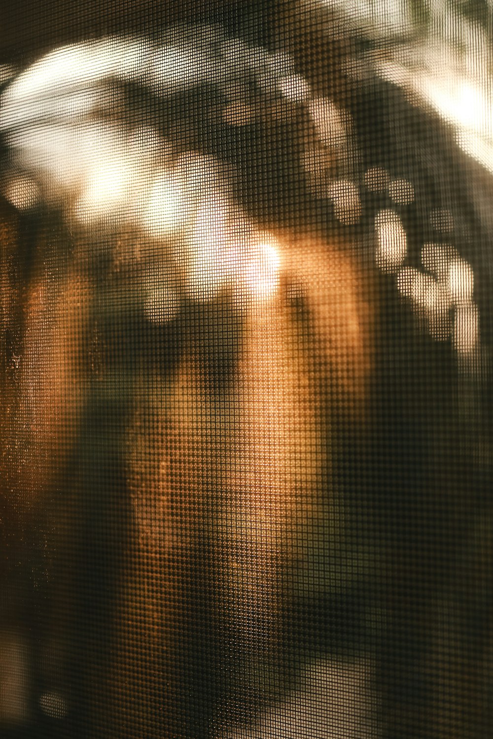 a blurry image of a person holding an umbrella