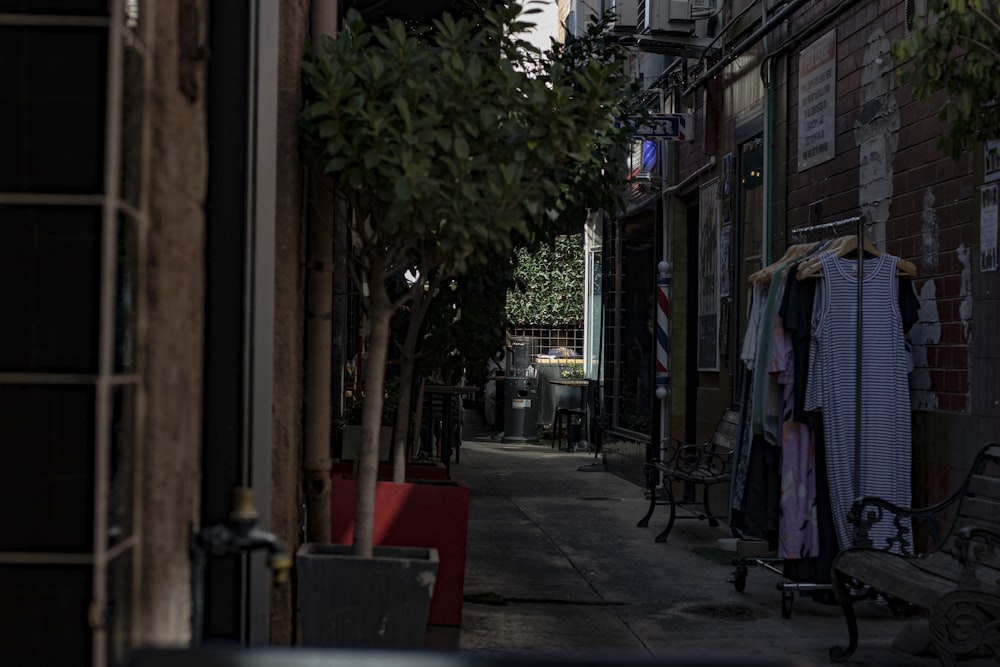 an alley way with clothes hanging on a clothes line