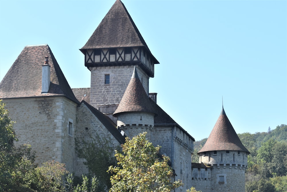 a castle with a clock on the top of it