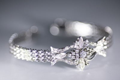 A stylish bangle bracelet adorned with diamonds.