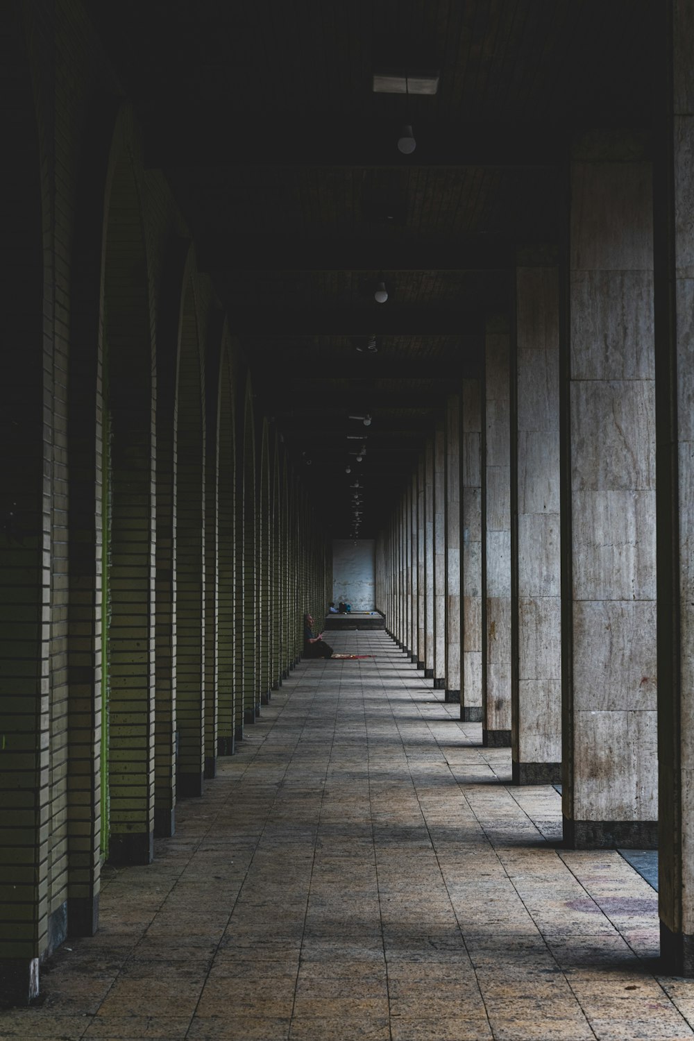 a row of empty benches sitting next to each other