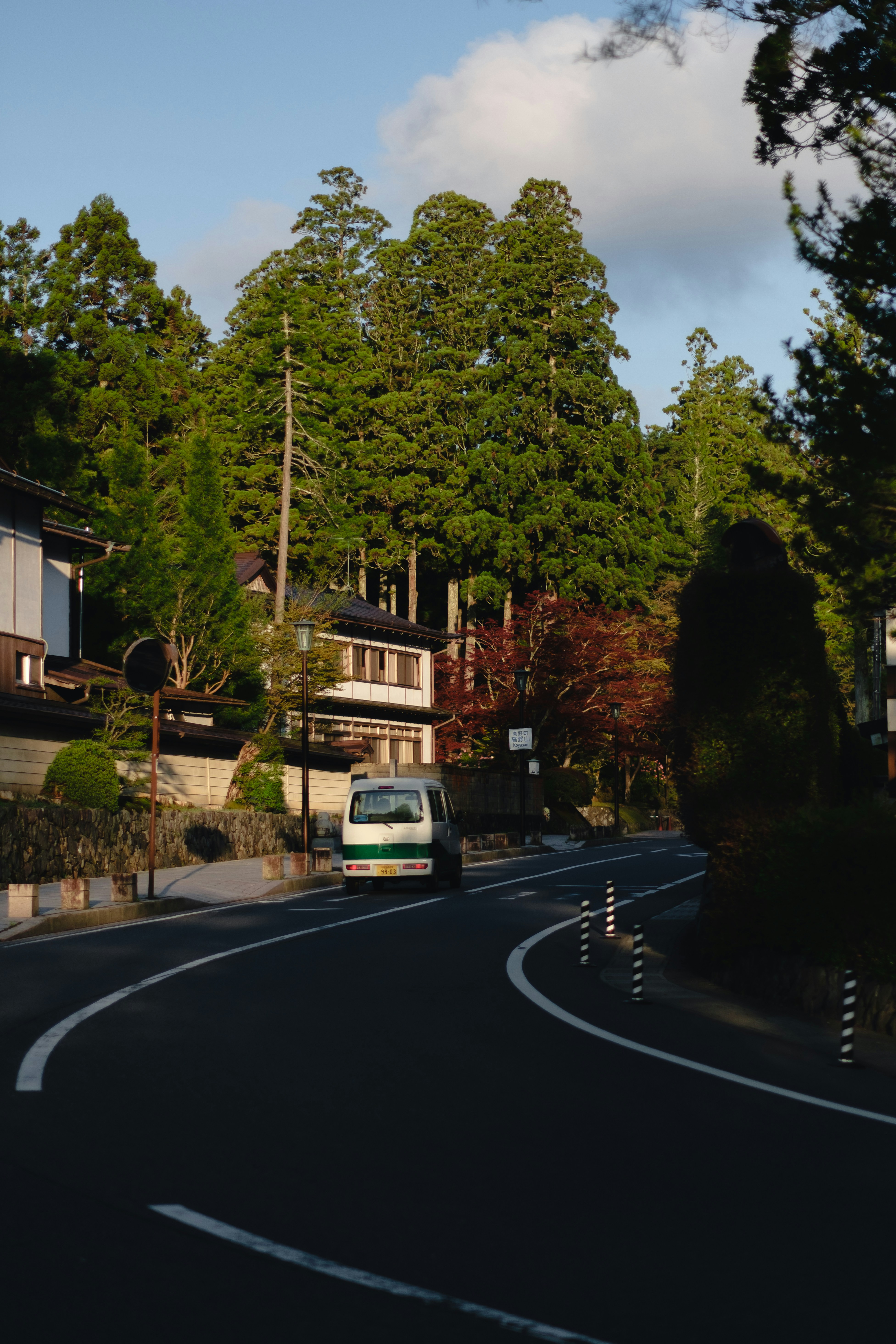 a car is driving down a curvy road