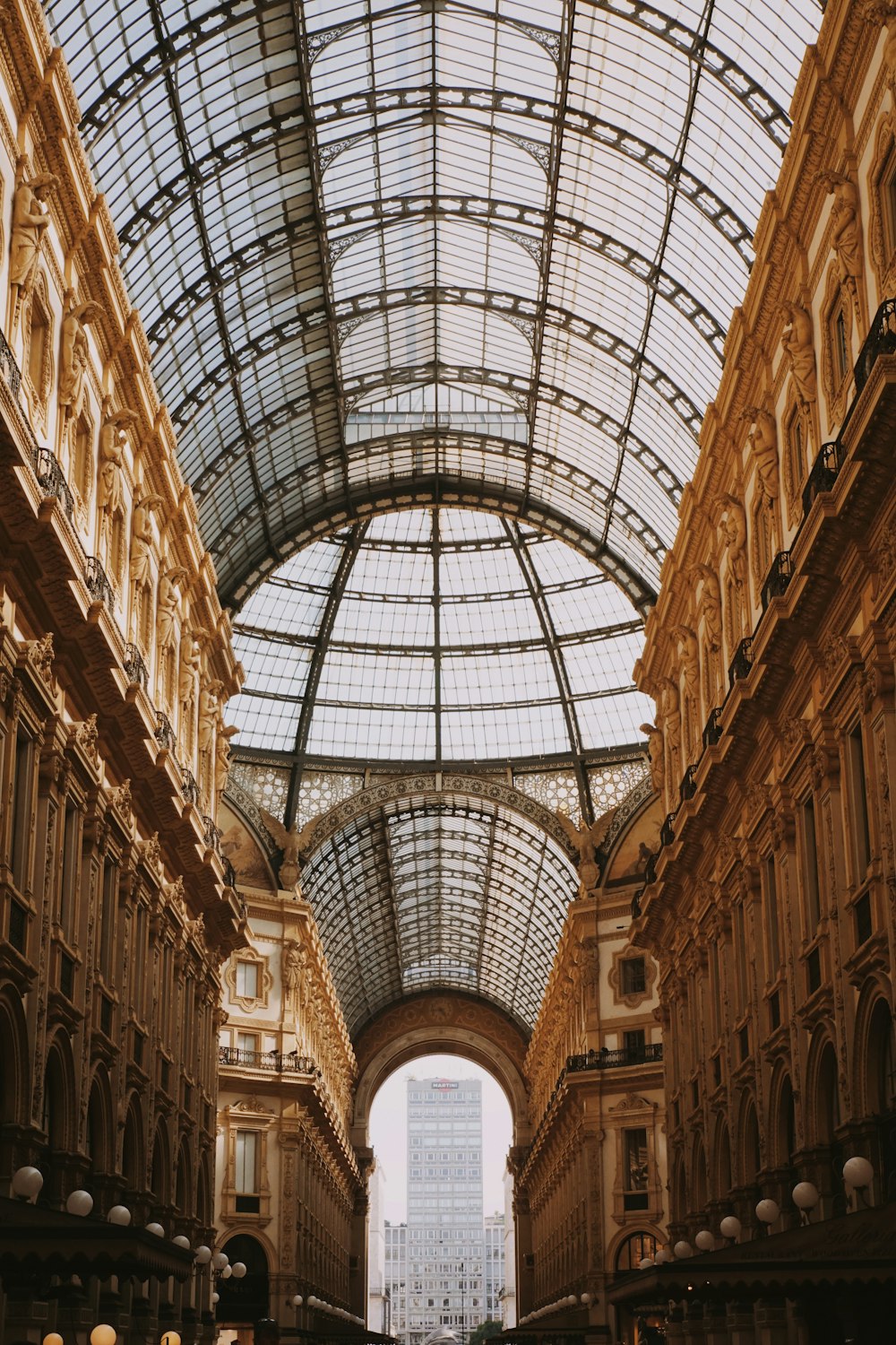 the inside of a building with a glass ceiling