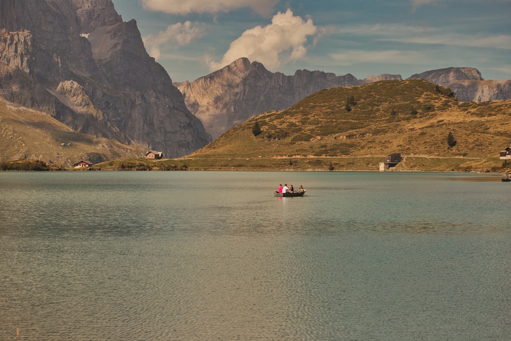 a small boat in a large body of water