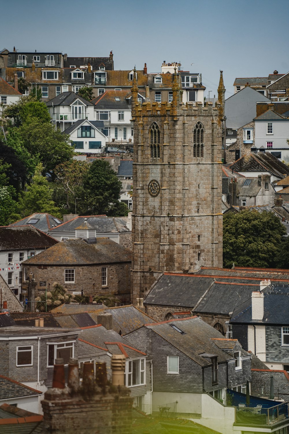 a large clock tower towering over a city