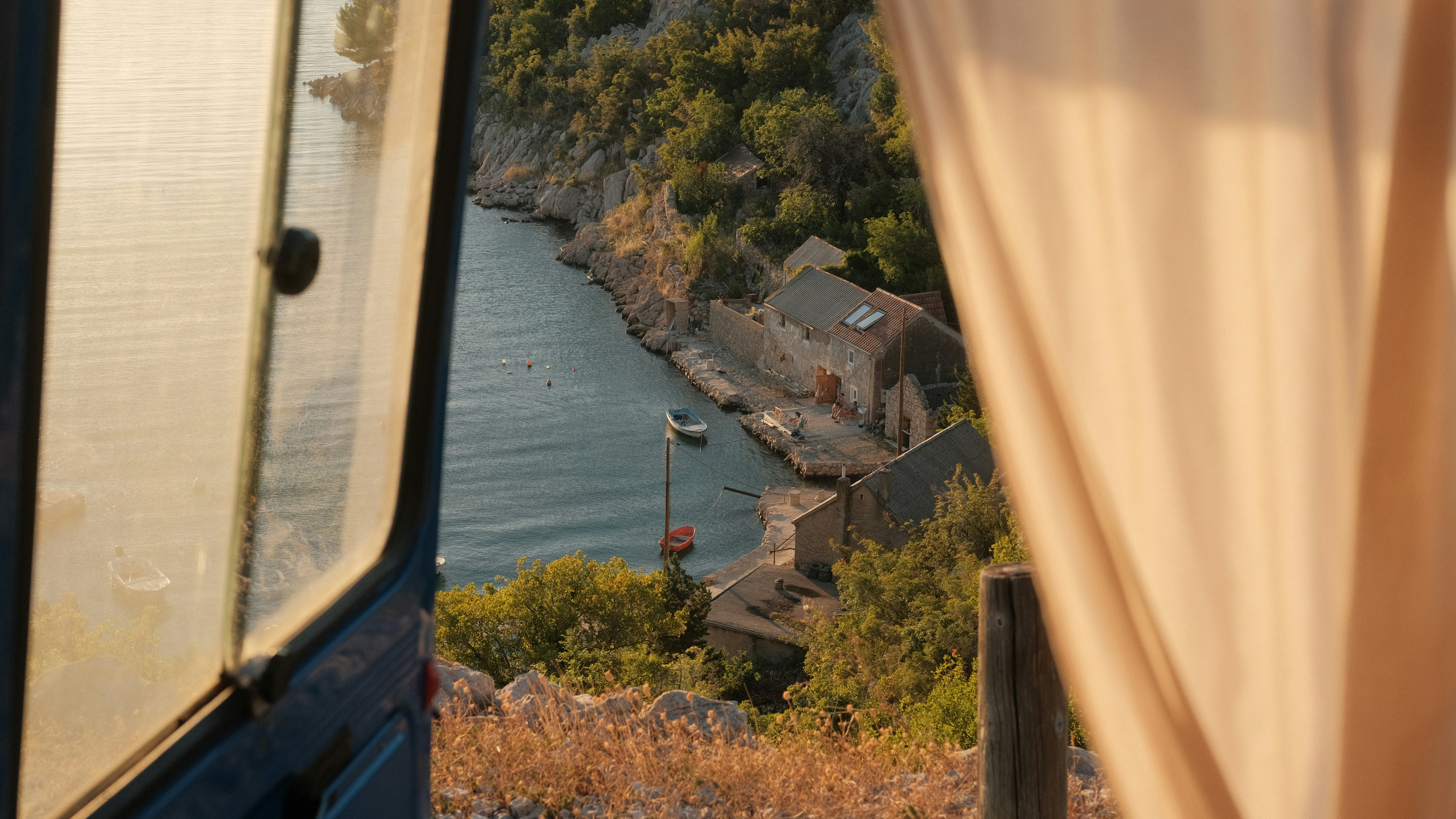 a view of a body of water from a window, Croatia