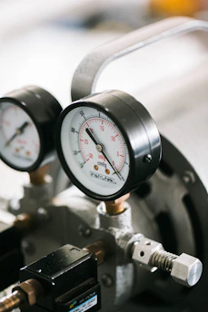 a close up of a pressure gauge on a machine