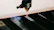 Metal cutting robot precisely slicing through thick steel sheets in a workshop.