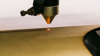 a close up of a metal object with a light on it